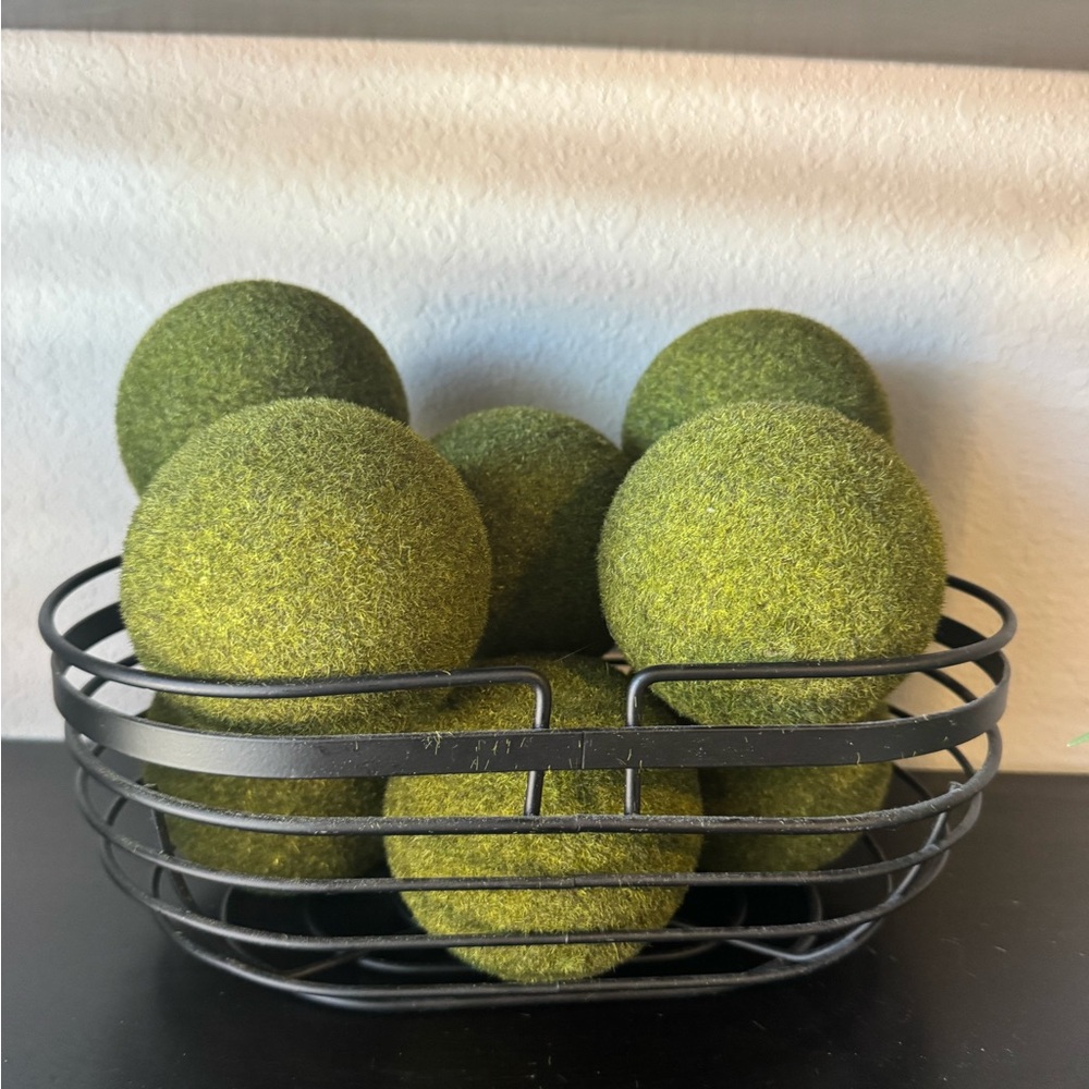 Green Decorative Balls in Black Wire Basket